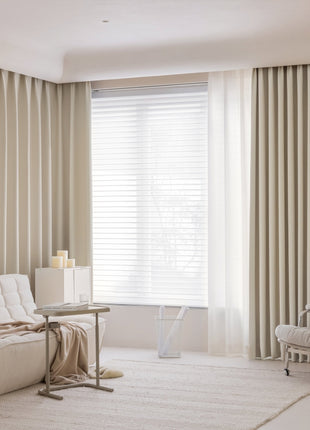 a living room with a couch and a chair