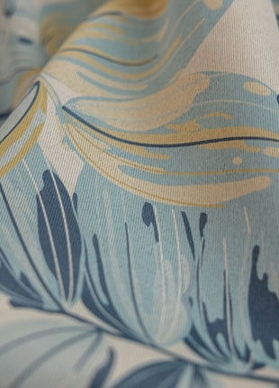 a close up of a blue and yellow fabric
