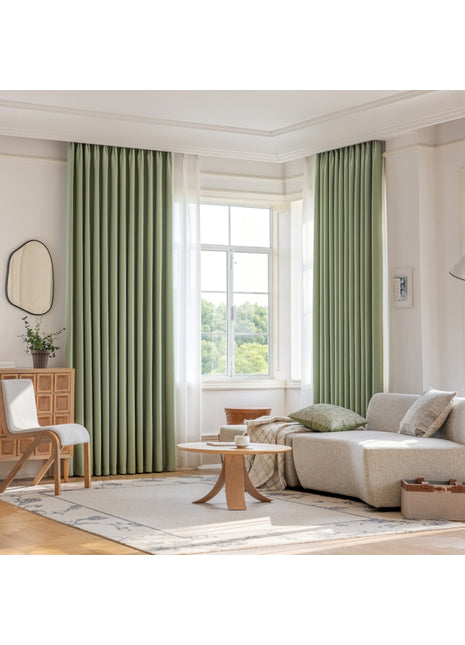a living room filled with furniture and a large window