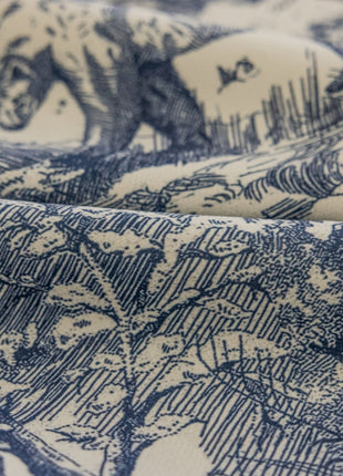a close up of a blue and white fabric
