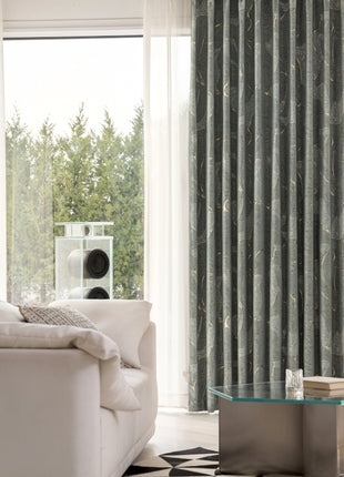 a living room filled with furniture and a large window