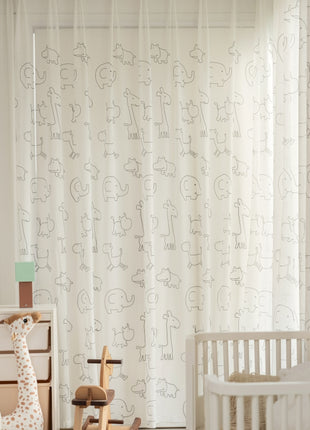 a baby's room with a crib and rocking horse