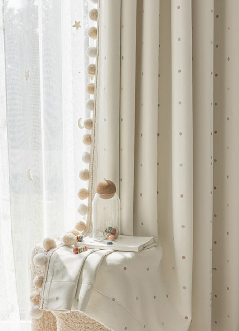 a white chair sitting in front of a window