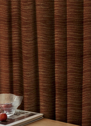 a bowl of fruit sitting on top of a table
