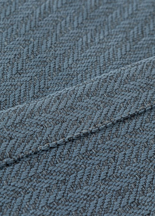 a close up view of a blue blanket