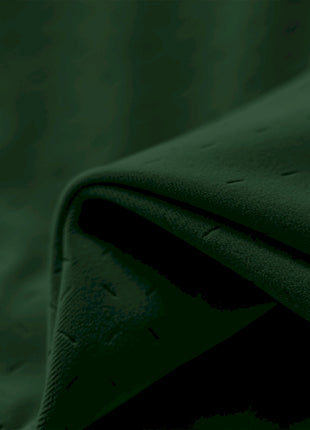 a close up view of a green fabric
