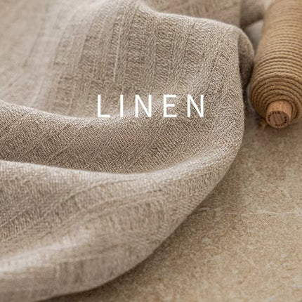 linen is laying on top of a table