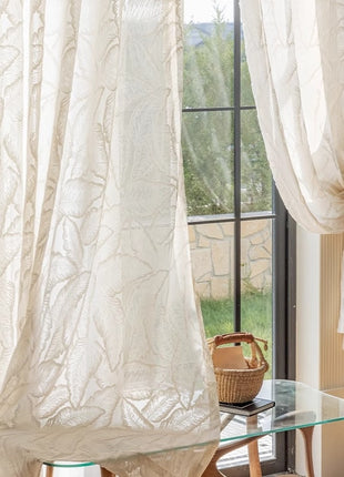 a glass table with a basket on top of it