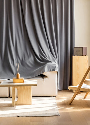 a living room with a couch and a table