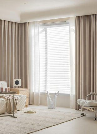 a living room with a couch and a chair