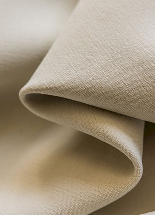 a close up view of a white fabric