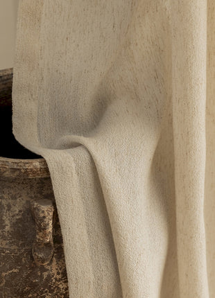 a close up of a cloth on a vase