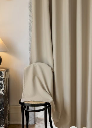 a chair and a lamp in a room