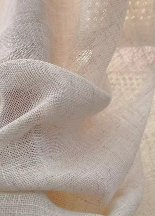 a close up view of a white fabric