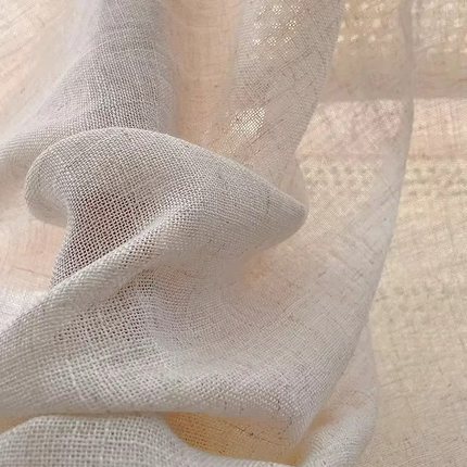 a close up view of a white fabric