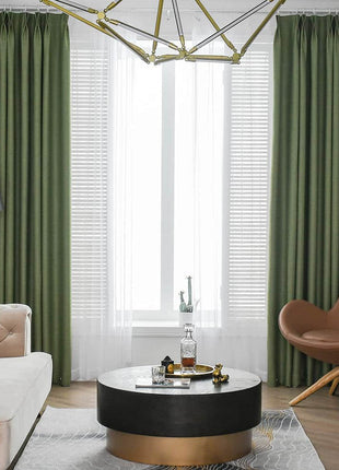 a living room filled with furniture and a chandelier