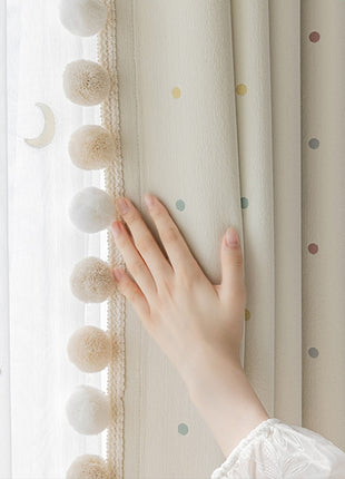 a woman's hand on the curtain of a window