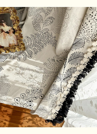 a picture of a woman in a dress on a table