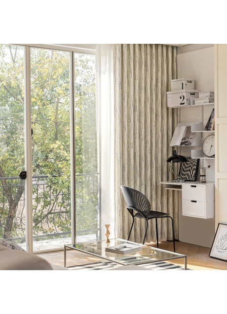 a living room with a glass coffee table