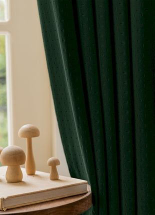 a book sitting on top of a table next to a window