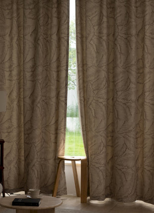 a living room with a couch and a window