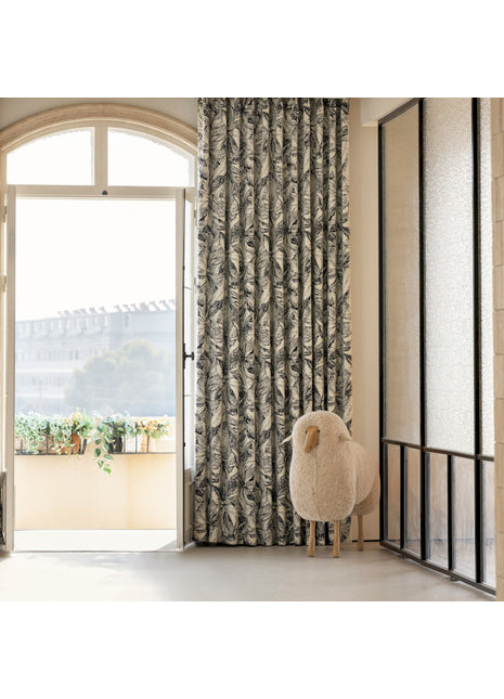 a sheep is standing in front of a door