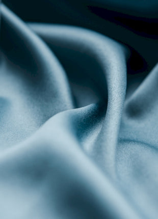 a close up view of a blue fabric