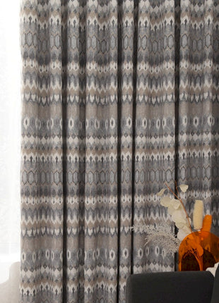 a living room scene with focus on the curtains