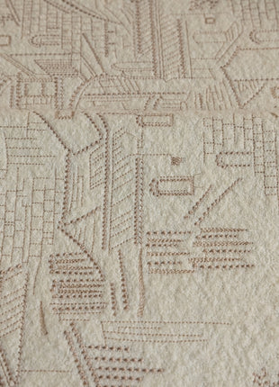 a close up of a piece of fabric with a pattern on it