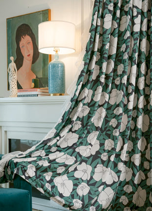 a living room scene with focus on the curtains