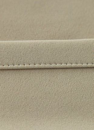 a close up of a beige fabric with stitching