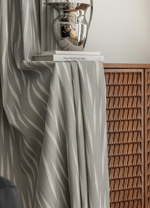 a table with a lamp on top of it