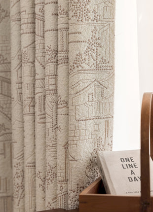 a wooden box with a book on top of it next to a window