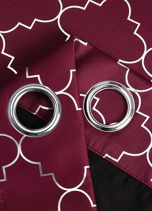 a close up of a tie with two rings on it