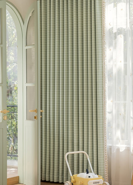 a suitcase sitting in front of a green door