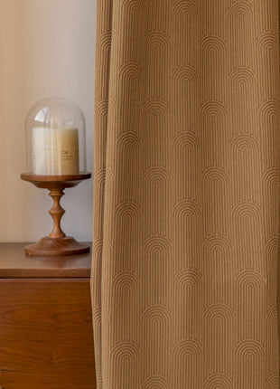 a wooden table with a candle on top of it