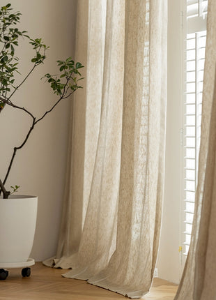 a potted plant sitting next to a window