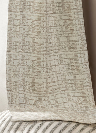 a close up of a blanket on a chair