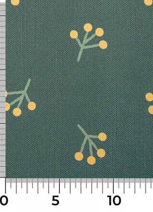 a ruler with a green and yellow pattern on it