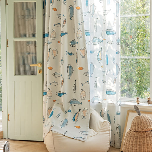 a living room with a chair and a window