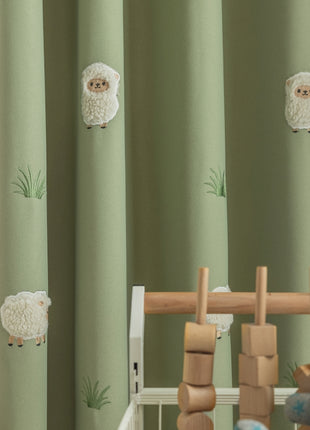 a baby crib with a stuffed animal next to it