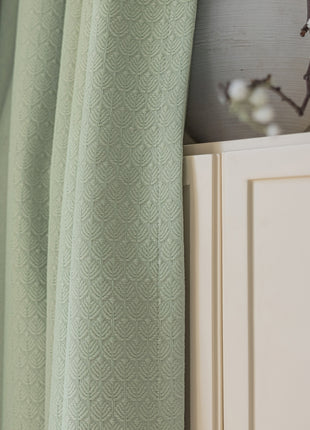 a close up of a curtain in a room