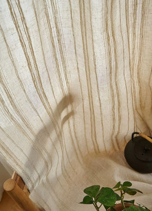 a potted plant sitting on top of a wooden table