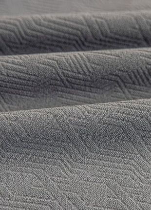 a close up view of a gray fabric