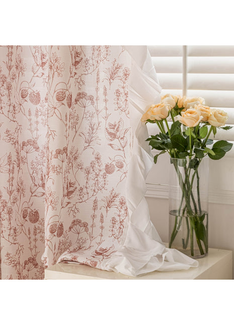 a vase filled with yellow roses next to a window
