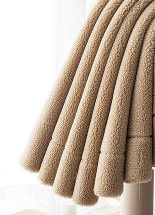 a close up of a towel hanging on a hook