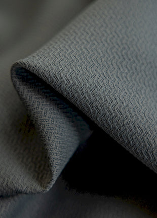 a close up of a gray fabric