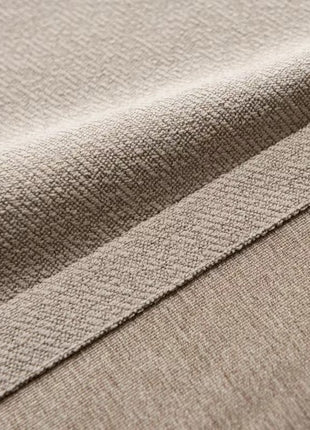 a close up view of a beige fabric