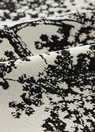 a close up of a black and white fabric