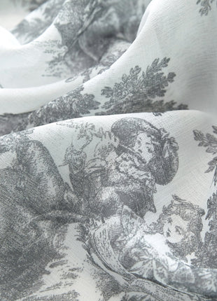 a close up of a white and black fabric